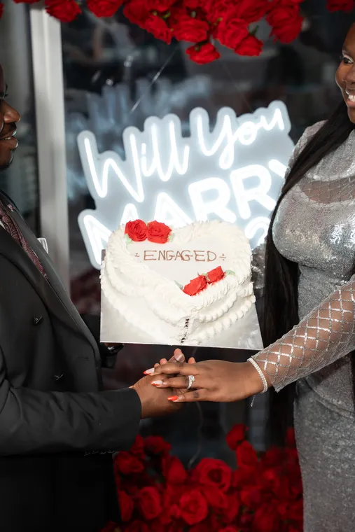 Their ‘Engaged’ cake